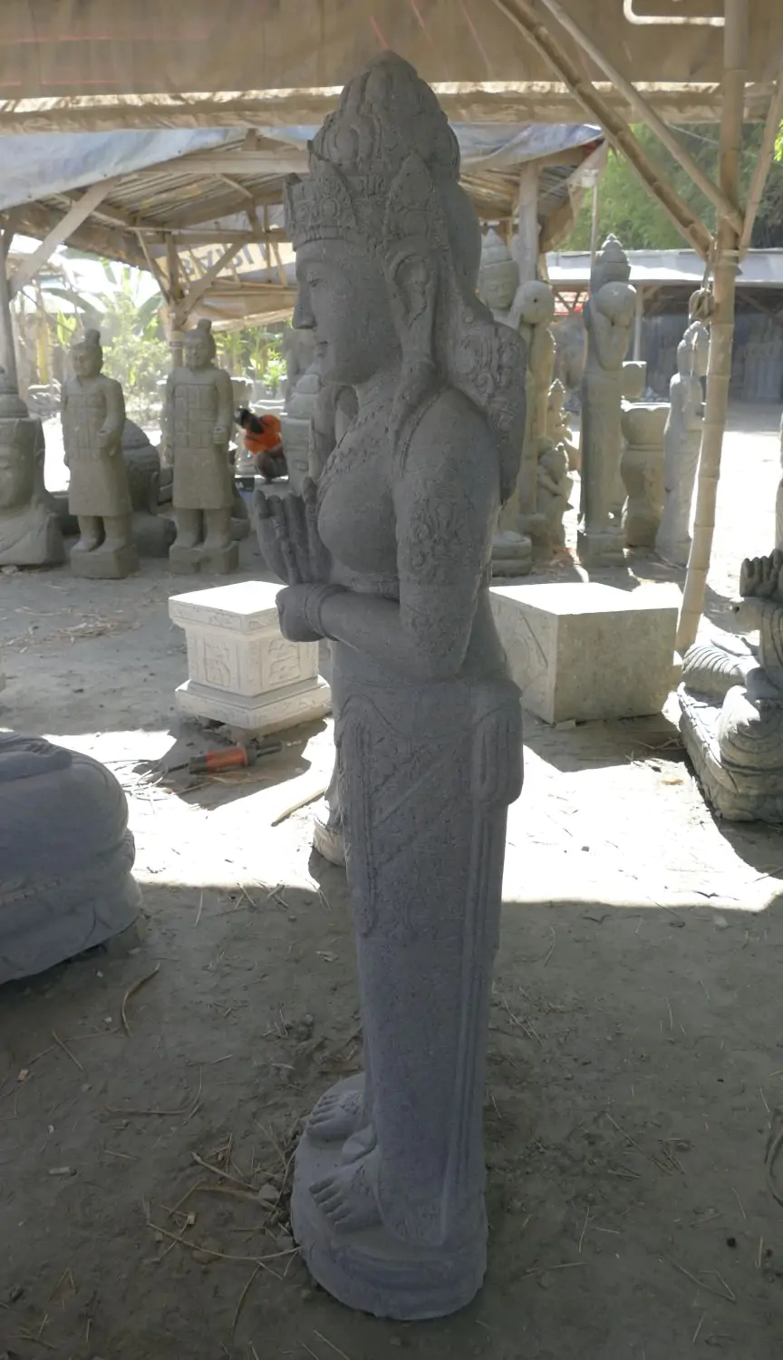 Product image 7 of the product “Standing Dewi Sri, position greetings turning the wheel ,160cm high riverstone grey ”